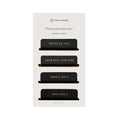 Magnetic Bookmarks featuring four black bookmarks with gold text for focus areas and planning.